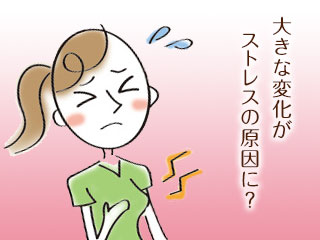 ストレスで胸を押さえる女性