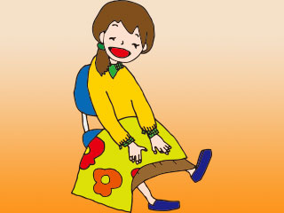 ひざ掛けをする女性