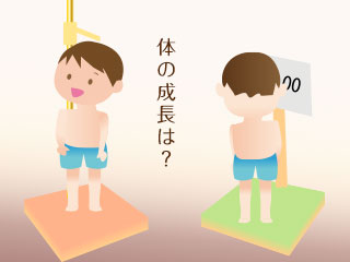 身長と体重を量る子供