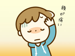頭を押さえる子供