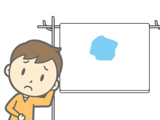 おねしょした布団を干す少年