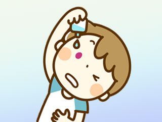 充血した目に薬をさす子供