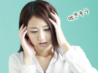 吐きそうな女性