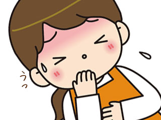 吐きそうになり、口に手をやる女性