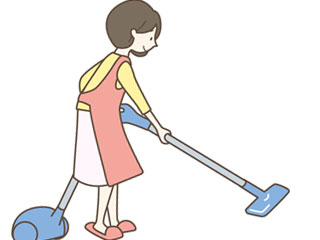 掃除機をかける主婦