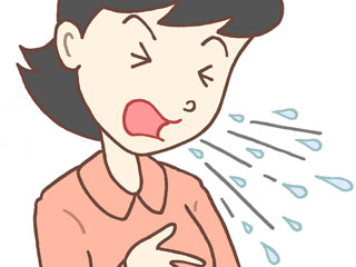 咳でつばを飛ばす女性