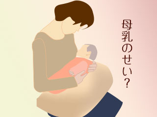 赤ちゃんを授乳クッションにのせる母親