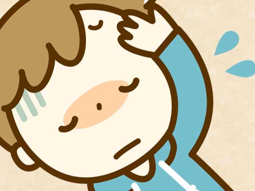 熱が出て頭を押さえている男の子のイラスト