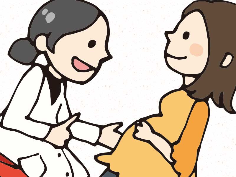 産婦人科で診察を受ける妊婦のイラスト