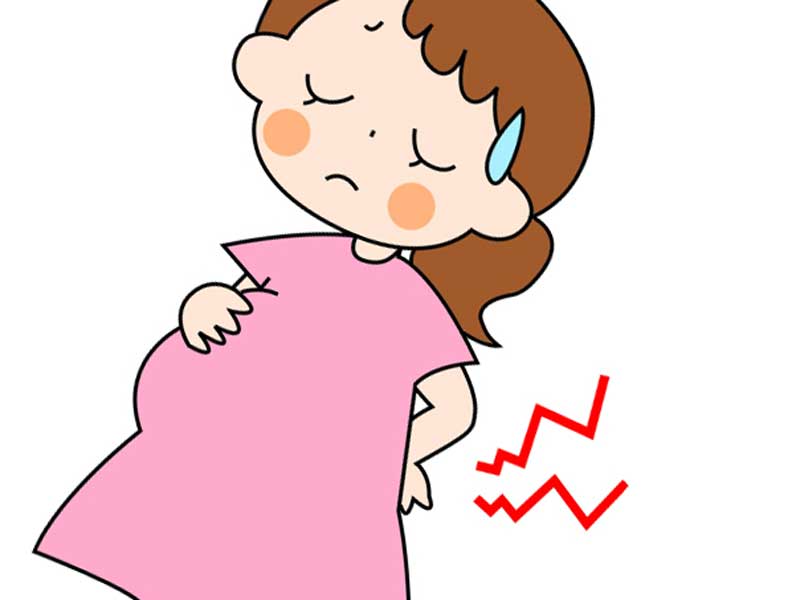 立っているだけで腰を痛そうにしてる妊婦さんのイラスト
