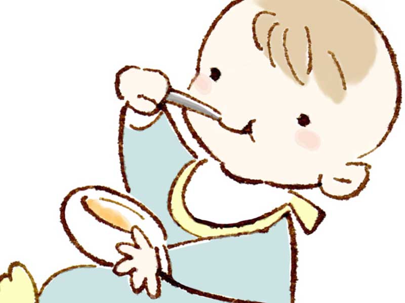 離乳食を食べている赤ちゃんのイラスト