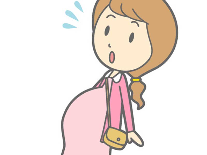 お腹が違和感を感じる妊婦のイラスト