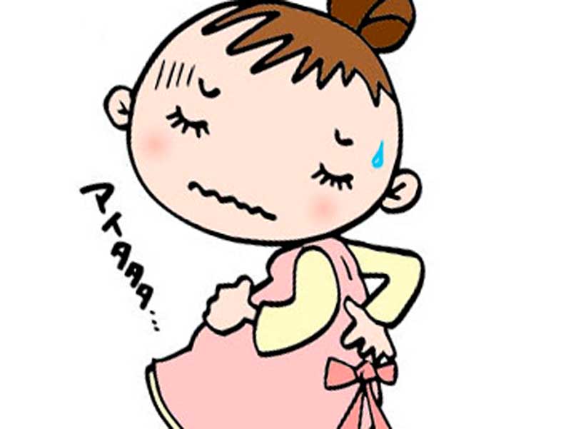 腰痛で腰をおさえている妊婦さんのイラスト
