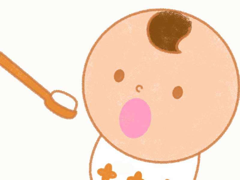 離乳食を食べている赤ちゃんのイラスト