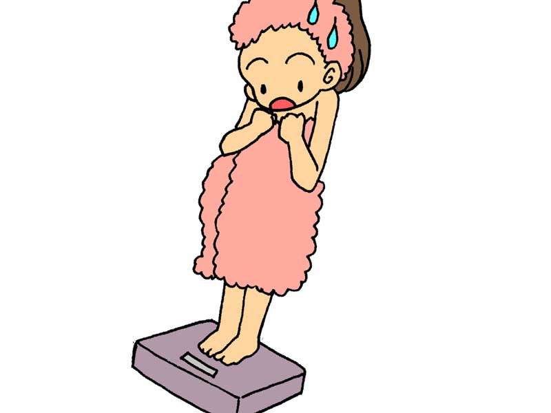 体重を量る妊婦のイラスト
