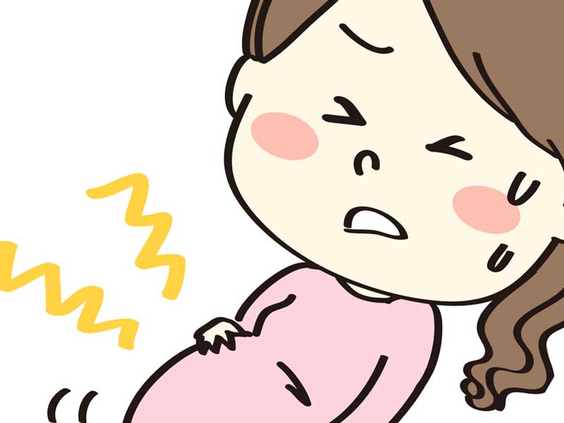 陣痛が起きている妊婦さんのイラスト