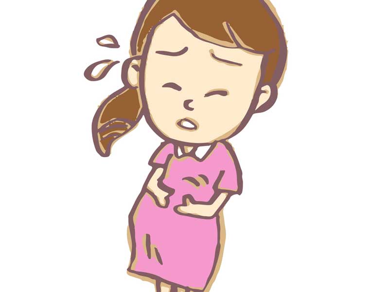 お腹の痛みを感じる妊婦さんのイラスト