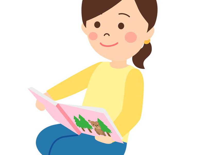 お腹の赤ちゃんに絵本を読み聞かせている妊婦さんのイラスト