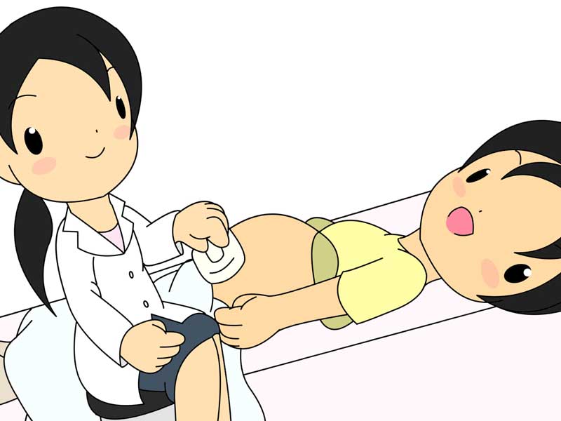 医師に相談してるエコー検査を受けている妊婦さんのイラスト