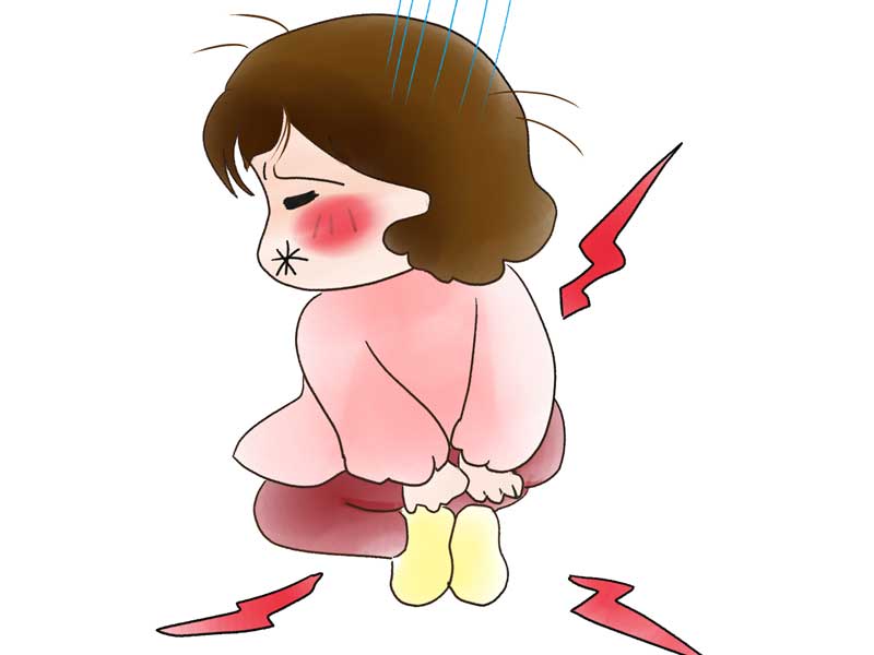 イボ痔で痛がるお母さんのイラスト