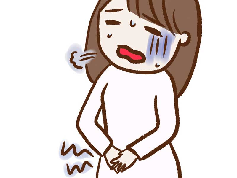月経でおなかを痛がる女性のイラスト