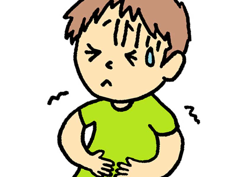 腹痛でお腹をおさえている子供のイラスト