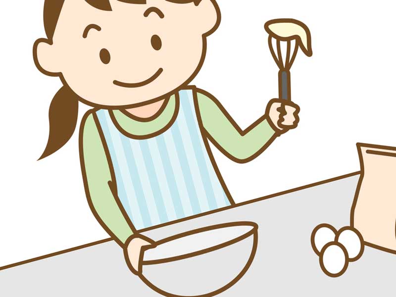 卵で料理をする女の人