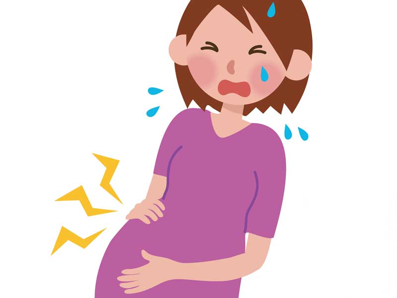 激しい下腹痛の妊婦さんのイラスト