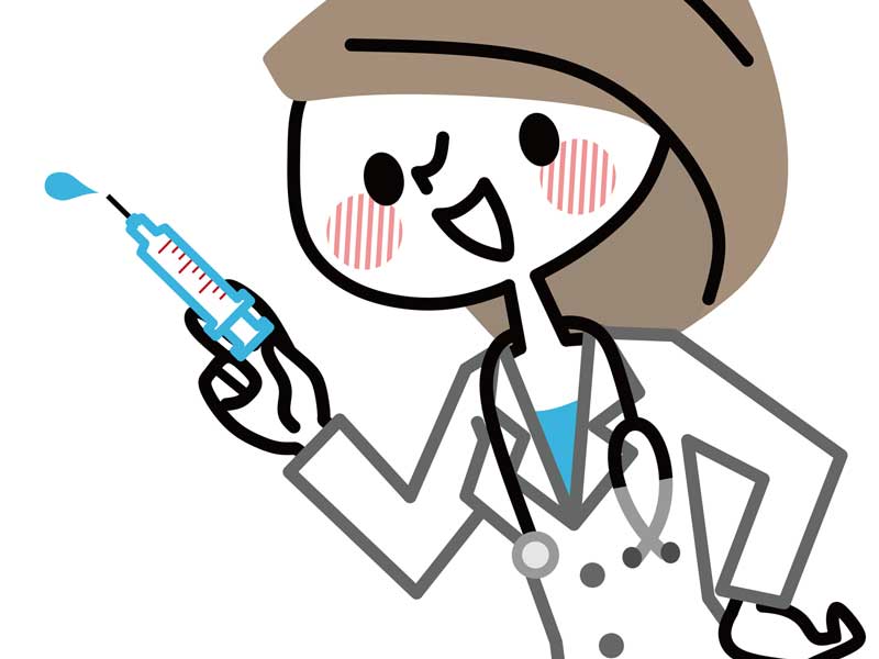 注射器を持つ医師のイラスト