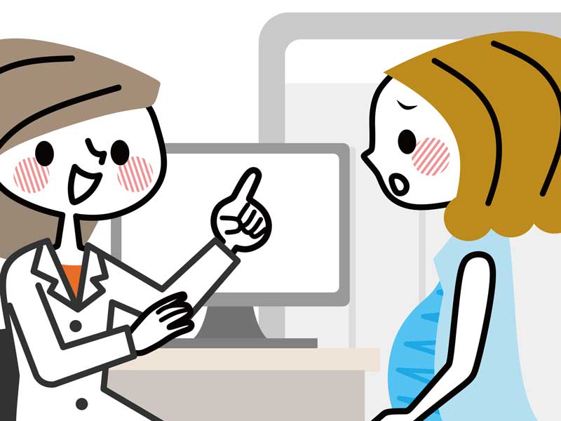 産科医と相談する妊婦さんのイラスト