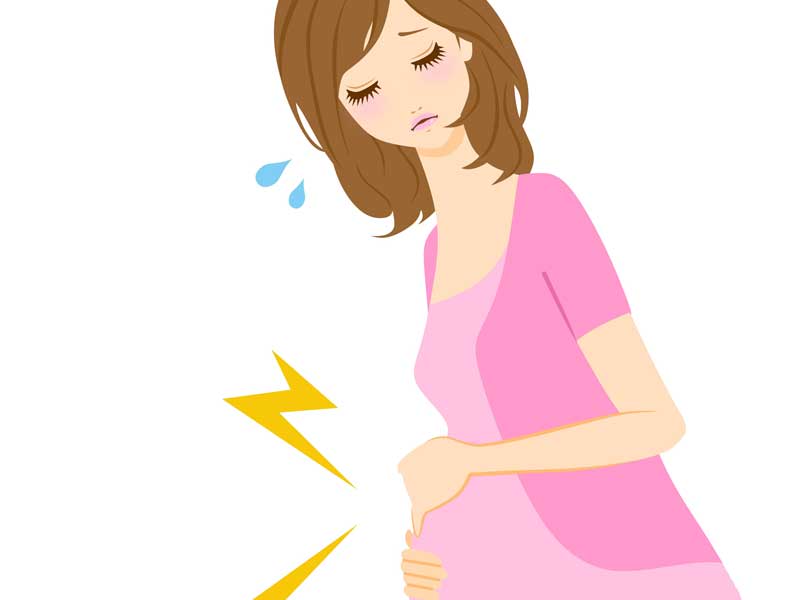お腹の痛みを感じている妊婦さんのイラスト