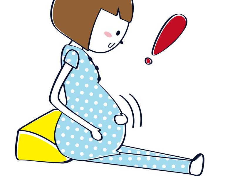 胎動を感じるママのイラスト