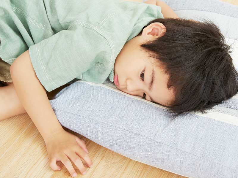 体調が悪い男の子