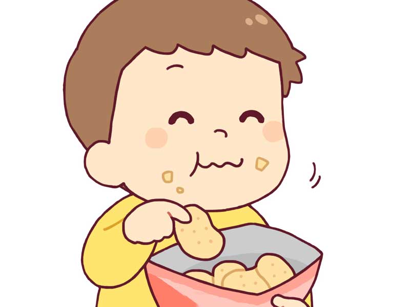 お菓子を食べる男の子のイラスト