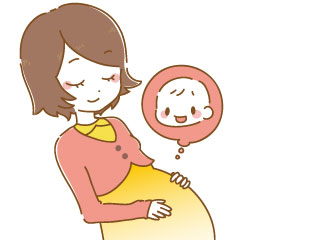 お腹をさわりながら赤ちゃんの事を思う妊婦